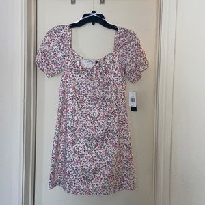 Natural/Mauve mini dress with pink florals made by City Triangles.